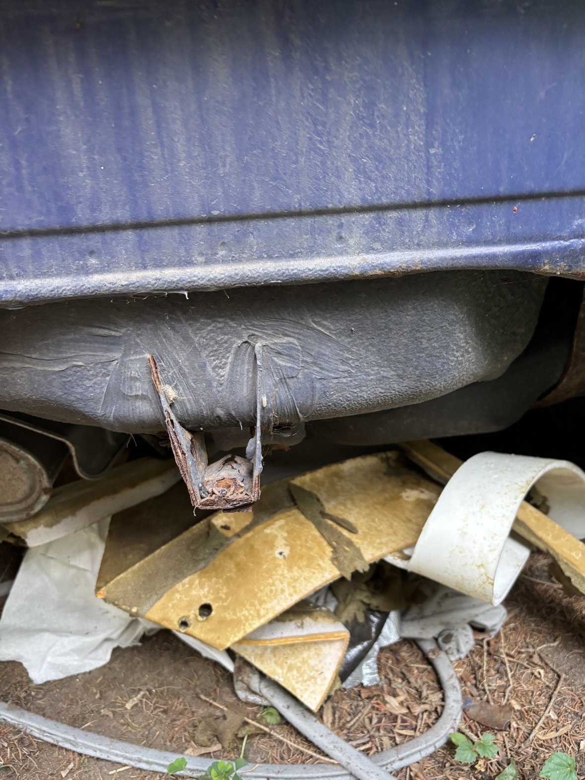 Corroded bracket beneath the Harlequin